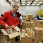Peter Wallace '93 volunteering at Houston Food Bank