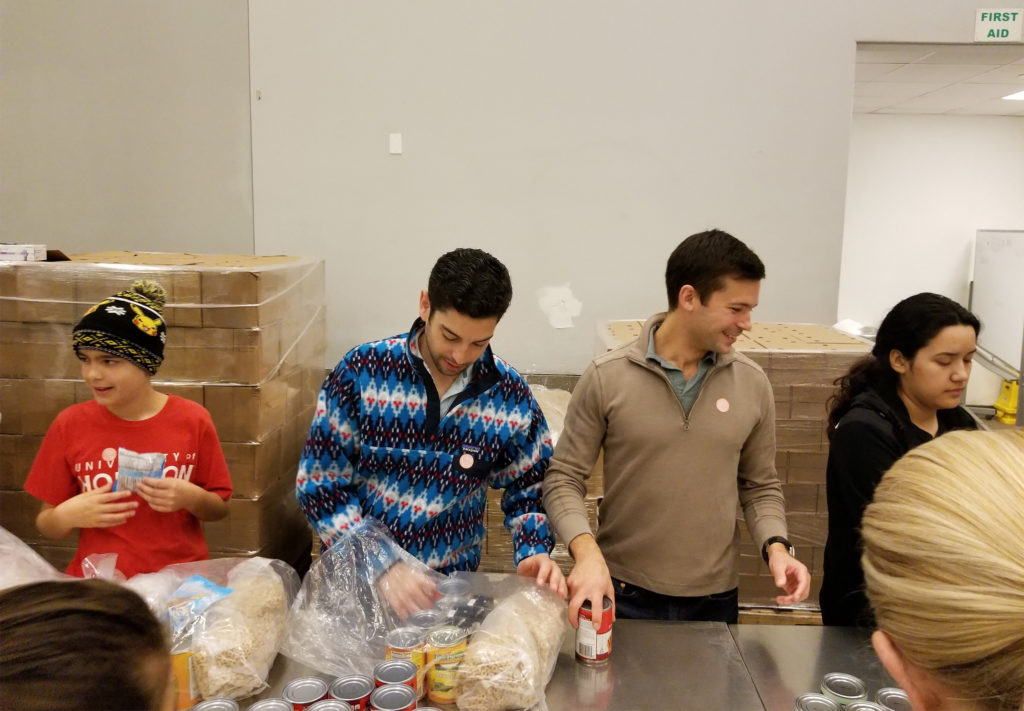 Webbies volunteering at Houston Food Bank