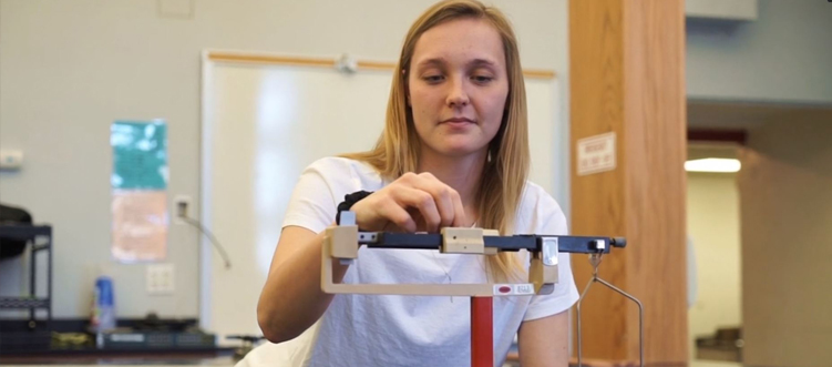 Student working in physics lab