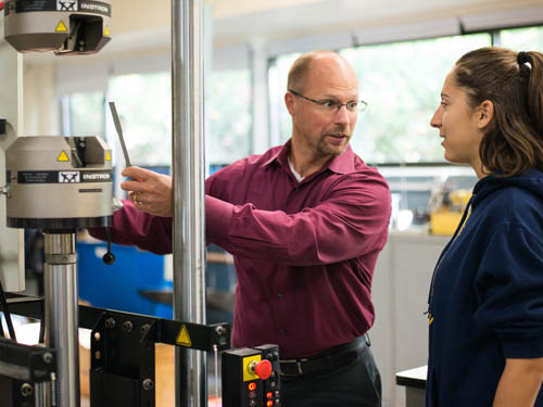 Dean Werner with student in Haeberle Lab